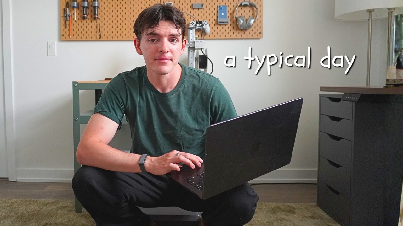 Jack Friks sitting cross-legged with a laptop in his home office, from the Starter Story How I Work video published 2 August 2026